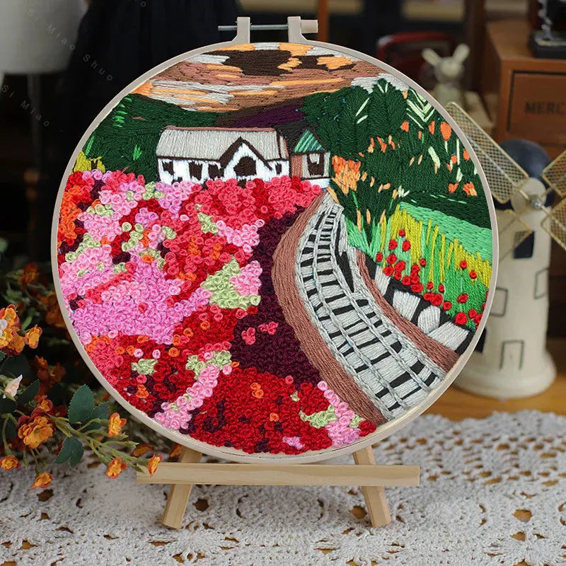 Borduurpakket Rond – Bloemenlandschap in 3D Kruissteek