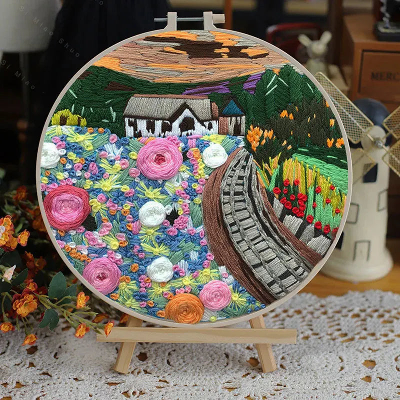 Borduurpakket Rond – Bloemenlandschap in 3D Kruissteek